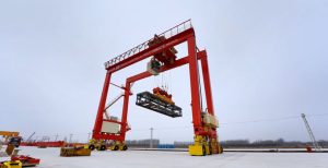 Container crane spreaders for port terminals