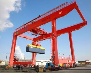 Container crane spreaders for port terminals