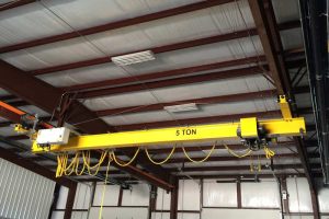 Low headroom overhead travelling crane for limited space